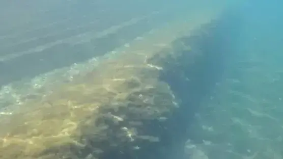 Before image of underwater concrete pipe