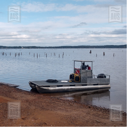 Dive barge preparing for tree stump removal job